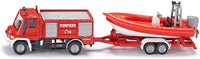 Fire engine model with attached red rescue boat on trailer, 1:87 scale.