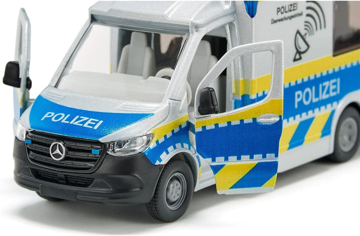 Mercedes-Benz police van model with open doors, front view, blue stripe livery