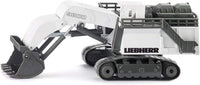White mining excavator model with 9800 marking, black bucket and full body view
