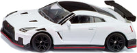 White die-cast sports car with black grille, red trim, and black wheels