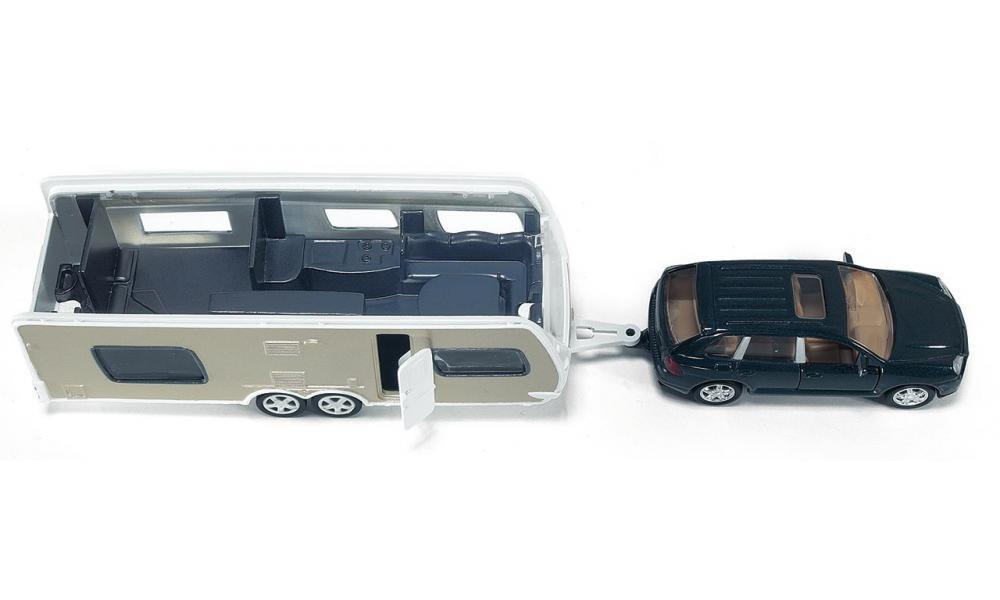 Siku 1:55 metal Porsche car and caravan set, caravan open with dark vehicle.
