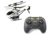 White and yellow RC helicopter with rotor blades and skids, with remote controller