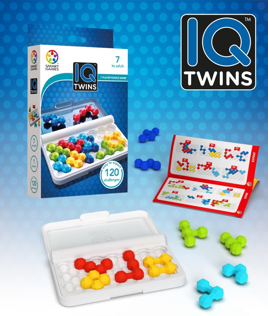 Puzzle game set with colored plastic pieces, white tray, and box packaging