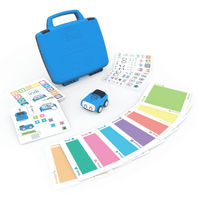 Blue education robot in carrying case with activity cards and colored tiles