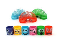 Assorted 65mm plastic funny face spring toys, multicolor with smiley faces