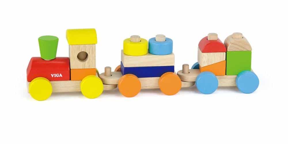 Wooden stacking train toy with colorful blocks and wheels, including a chimney tower
