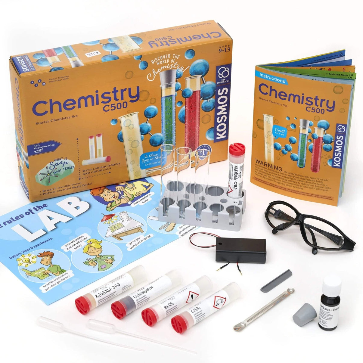 Chemistry experiment kit box with lab gear and instruction sheet