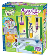 Chemistry station set box front with colorful lab artwork and purple beaker graphic