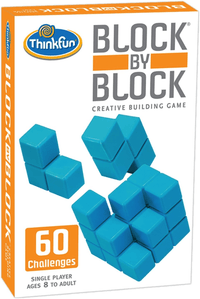 Turquoise interlocking block building game set with 60 challenge pieces in box