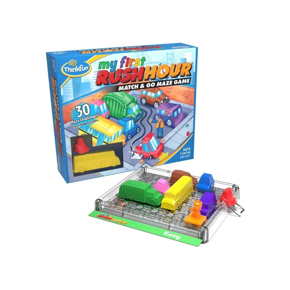 Rush Hour board game box with tray of colorful vehicles and challenge pieces