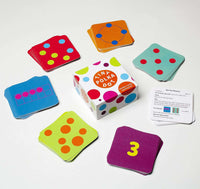 Polka dot number card game with colorful square tiles and a card box