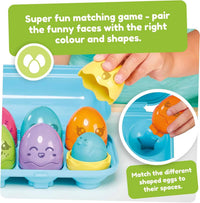 Colorful egg shape sorter toy with chick-face eggs in blue tray