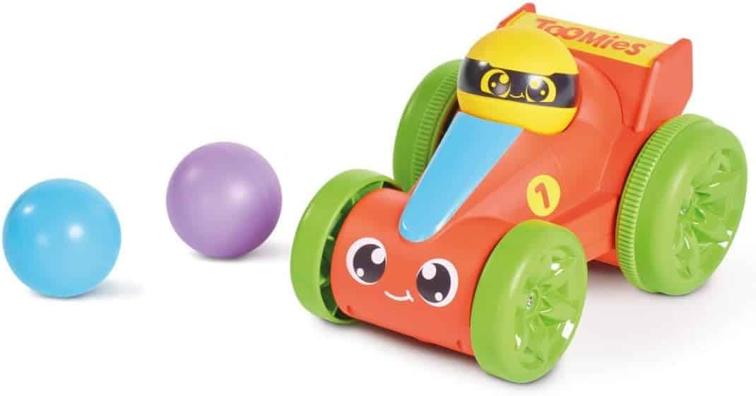 Red and green pop-up racing toy car with yellow driver and three colorful balls