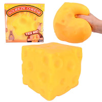 Set with yellow squishy cheese block and squeeze-style retail packaging box.