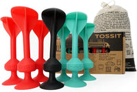 TOSSIT game starter pack pieces: red, black, and teal suction cups and funnels