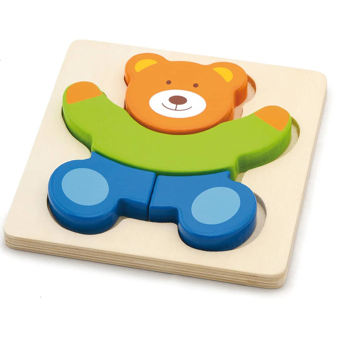 Bear-shaped mini block puzzle with colorful chunky pieces on wooden board