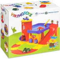 Toy two-story garage track playset in retail box, red yellow blue with ramp and car